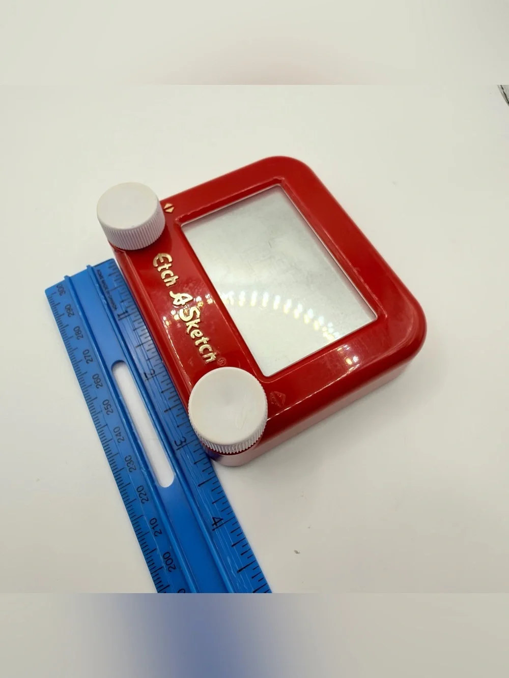 Pair of Mini Classic Red etch a Sketch toys